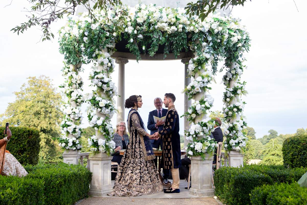 Romantic civil ceremony at Russets's outddor dome. Although the Bride & Groom are having a civil ceremony, they also had a Hindu cultural ceremony at the Venue on the same day, so they are dressed in cultural Asian outfits.