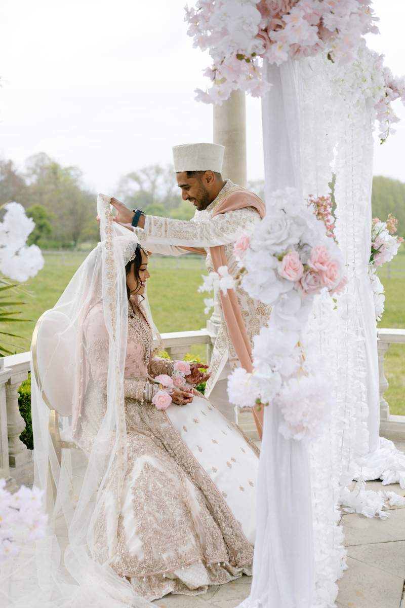 An outdoor Muslim wedding ceremony, known as a Nikkah, at Russets - the premier South Asian Wedding Venue in the UK