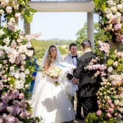 A Jewish Bride & Groom break the glass at their Chuppah ceremony at the iconic Dome at Russets Wedding Venue in Surrey.